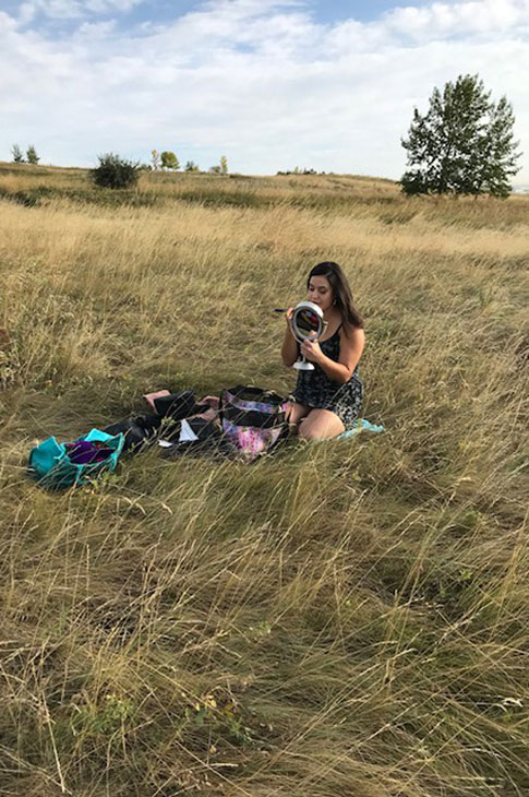 Stephanie Joe prepares for photoshoot in Nose Hill Park.