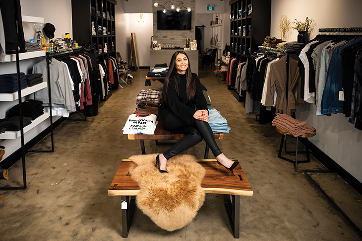 nw-women-sitting-on-a-table-in-clothing-store-730x485.png