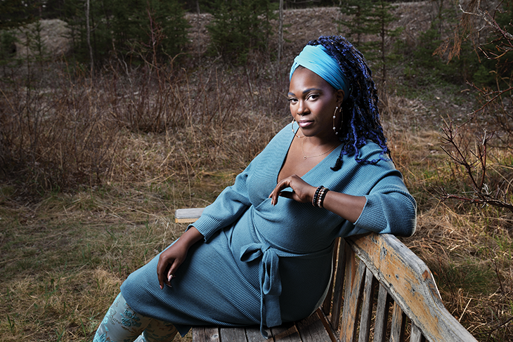 Adora Nwofor sitting on bench