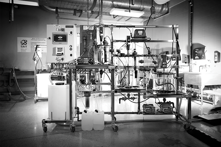 Black and white filtered image of a aerobic water treatment lab