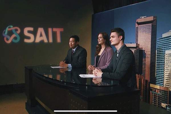 Broadcast News students at the SAIT News Desk. Image courtesy Instagram user @tiaruth_19