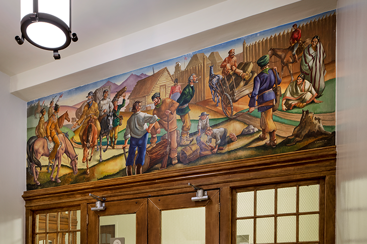full view of Ron Spickett mural in Heritage Hall
