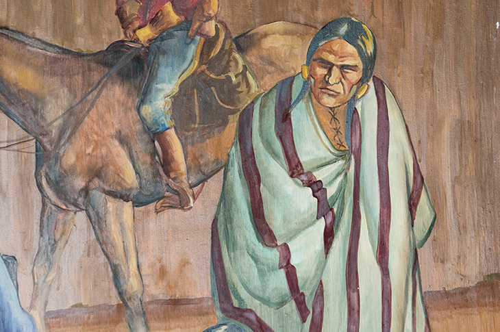 Close up of Indigenous person on mural