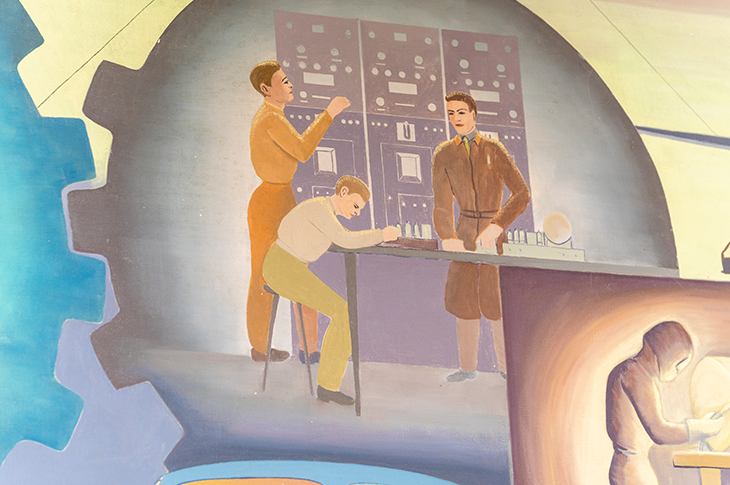 Close up of students on mural by Ted Browning