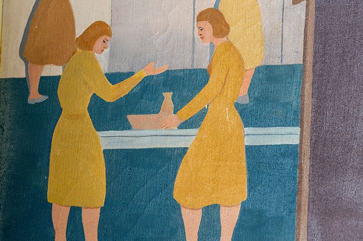 close up of two female students in yellow