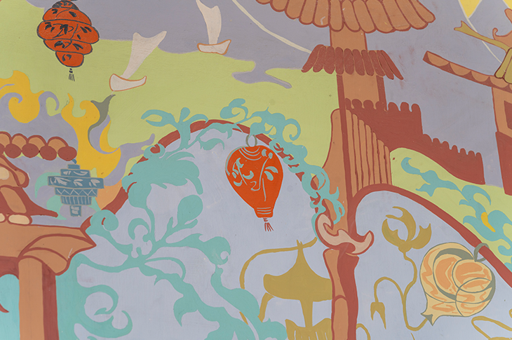 close up of mural detail of architectural work on bulding