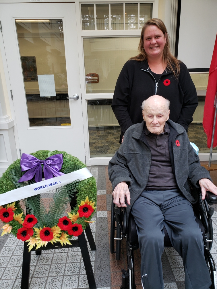 Clarence and his granddaughter Shiela McKillop at a Remembrance Day service.