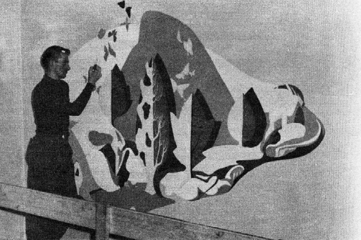 A PITA student painting a mural, 1950s.
