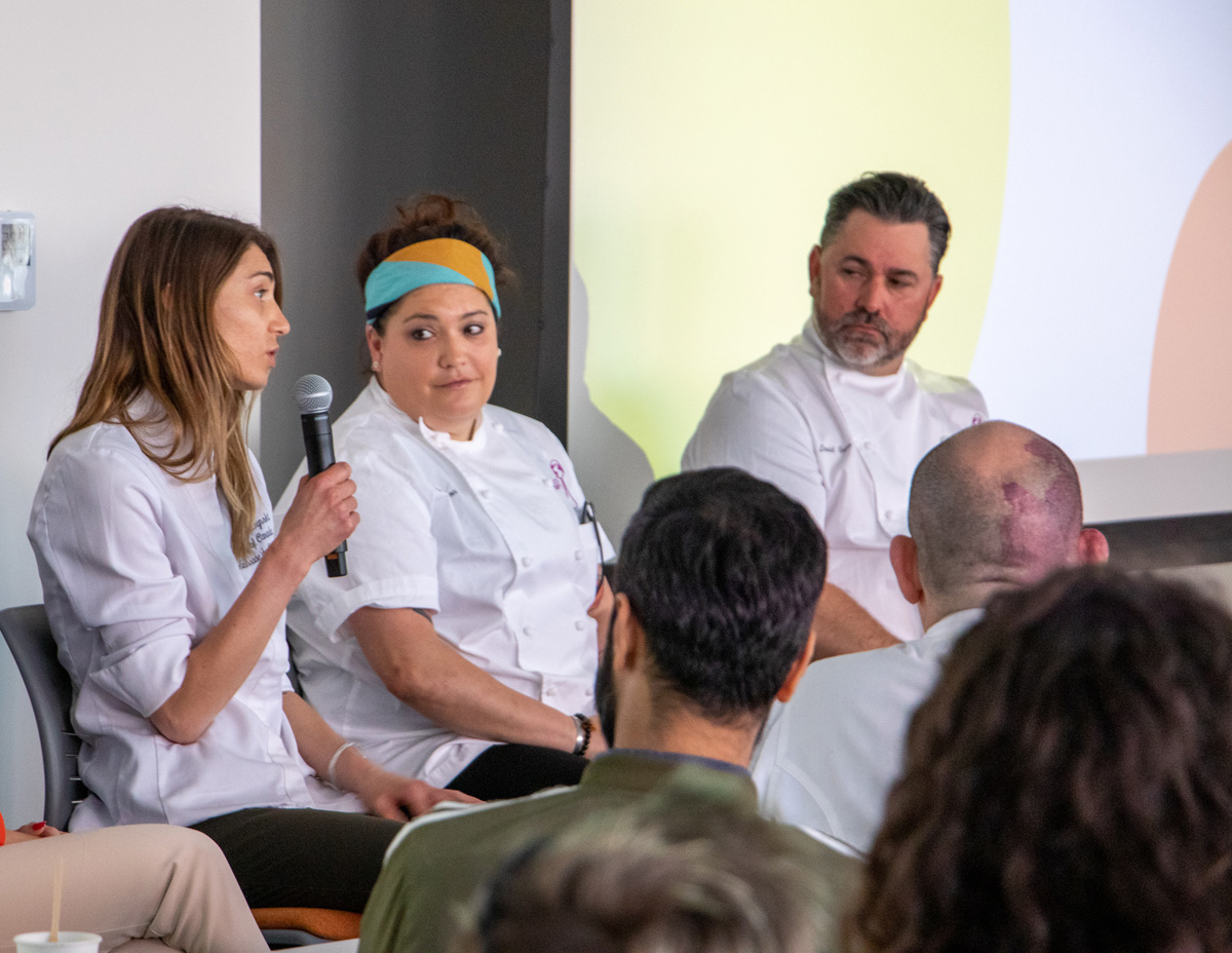 Chefs Chrapchynski, Mazon and Guas (left to right) during a panel discussion with students and instructors.