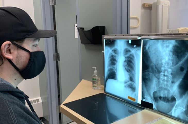 Participant uses x-ray machine