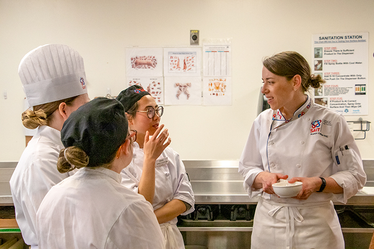 Chef Rosalyn Ediger speaks with students