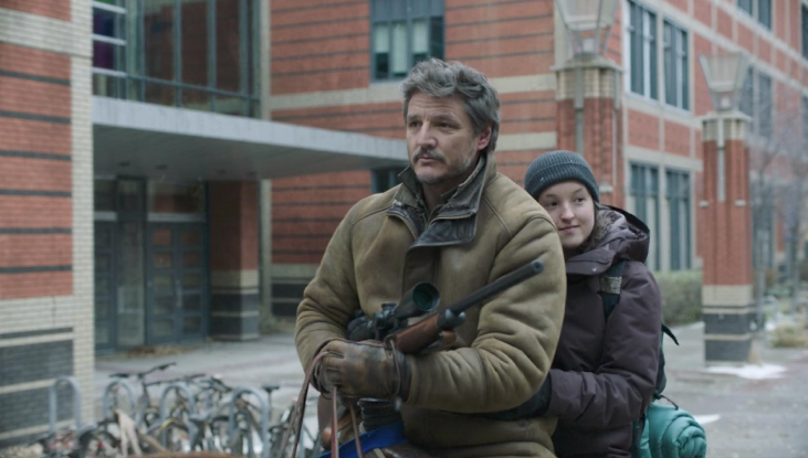 Characters Joel and Ellie from the HBO show The Last of Us ride a horse through SAIT’s campus, with the red-brick Stan Grad Centre building in the background.