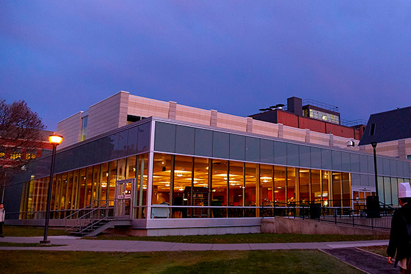 Exterior photo of the John Ware building on SAIT's main campus during the evening,