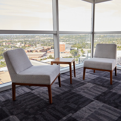 Lounge chairs setup at the penthouse at Begin Tower