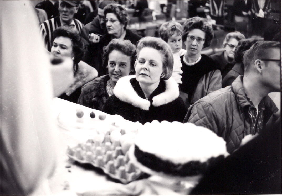 A black and white image of spectators at a culinary expo on SAIT campus in the 1950s.