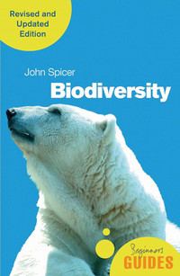 Book cover for biodiversity beginners guide with a photo of a polar bear on the front. why biodiversity matters with a white outline of a turtle on a turquoise background.