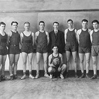 A group of men posing for a photograph on a sports team.