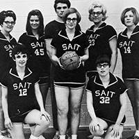A ladies sports team, posing for a photograph.